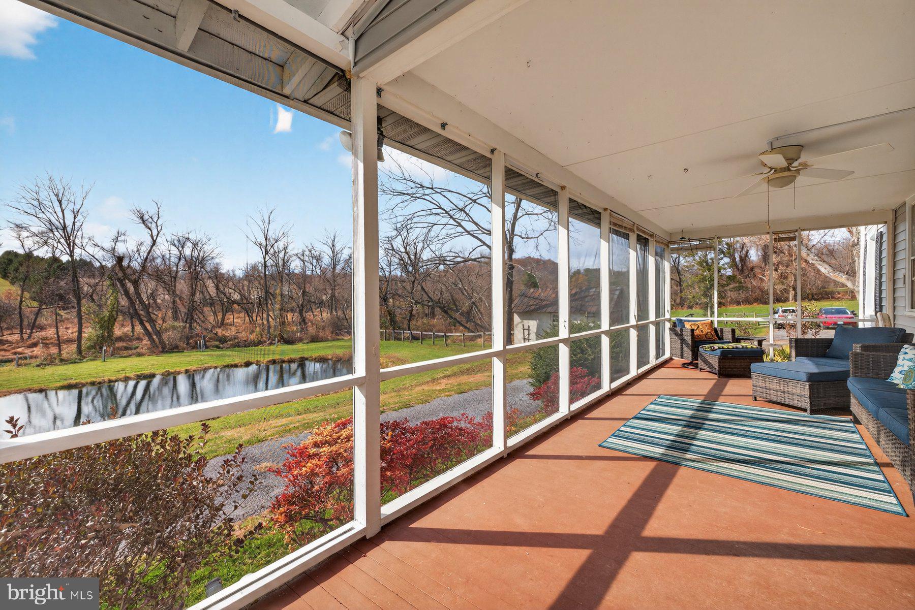 16306 Trenton Road Upperco, MD 21155 - Photo 34 of 55 a view of swimming pool with a sitting space