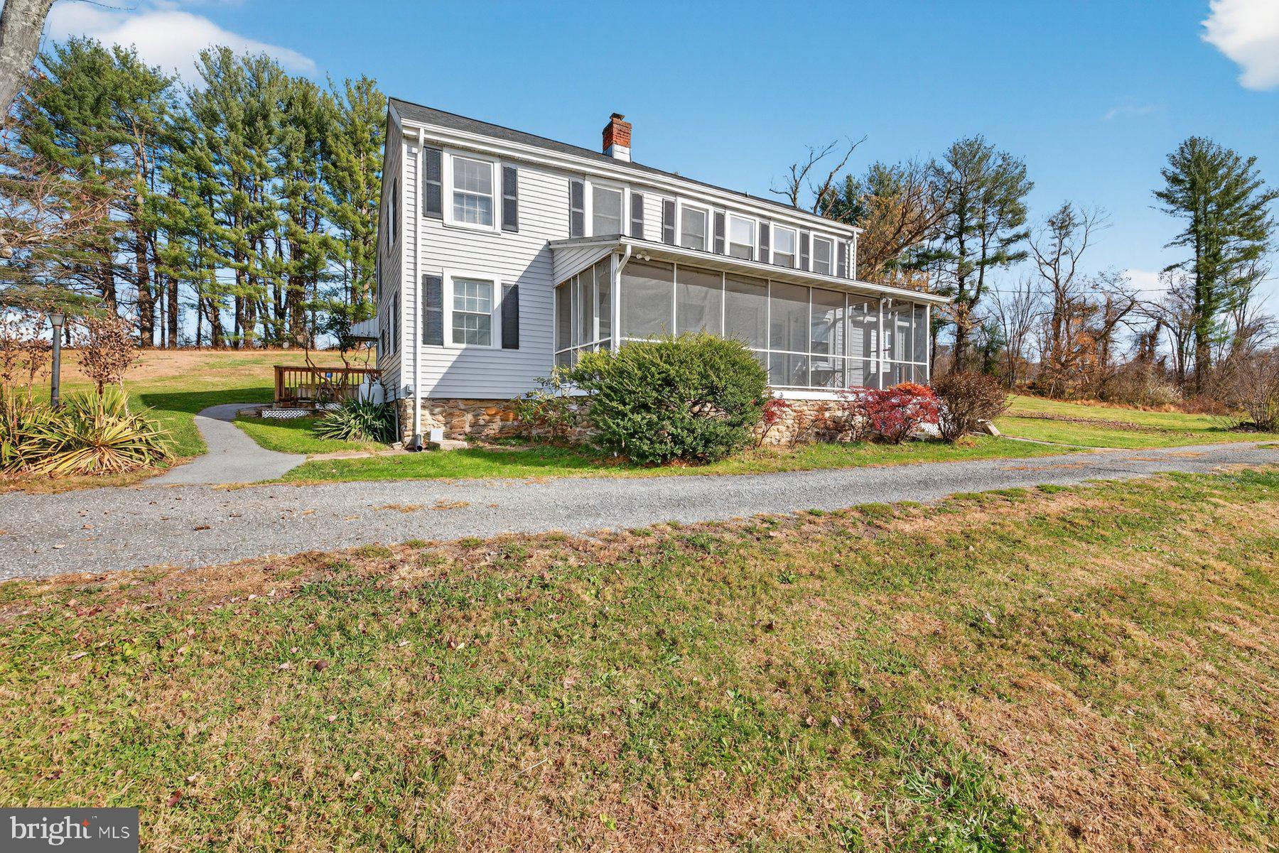 16306 Trenton Road Upperco, MD 21155 - Photo 35 of 55 a front view of a house with a yard