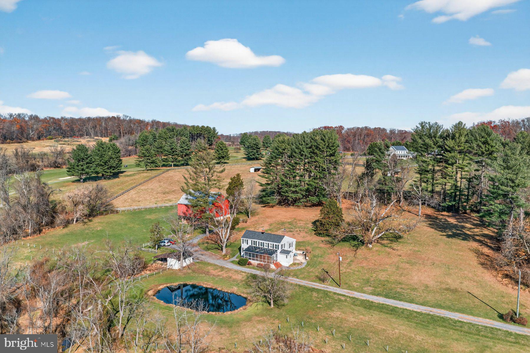 16306 Trenton Road Upperco, MD 21155 - Photo 39 of 55 a view of a swimming pool with a yard