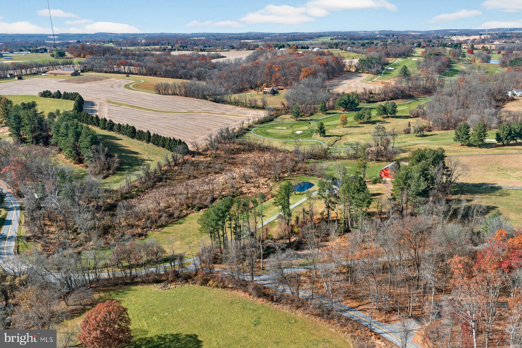 16306 Trenton Road Upperco, MD 21155 - Photo 42 of 55 a view of a lake with a mountain