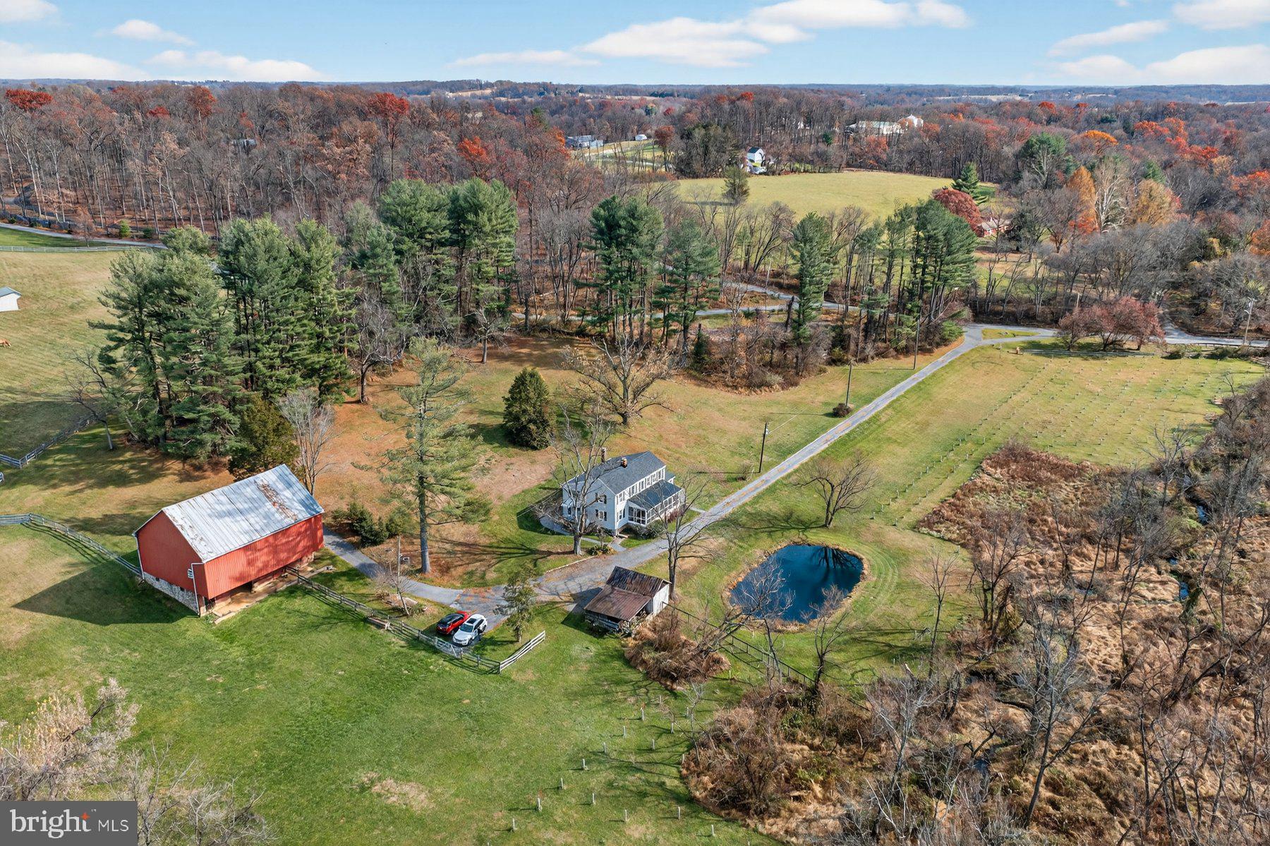 16306 Trenton Road Upperco, MD 21155 - Photo 47 of 55 an aerial view of residential houses with outdoor space and swimming pool