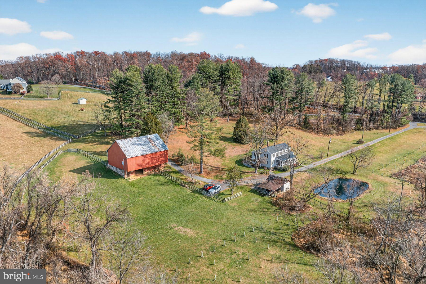 16306 Trenton Road Upperco, MD 21155 - Photo 50 of 55 a backyard of a house with table and chairs