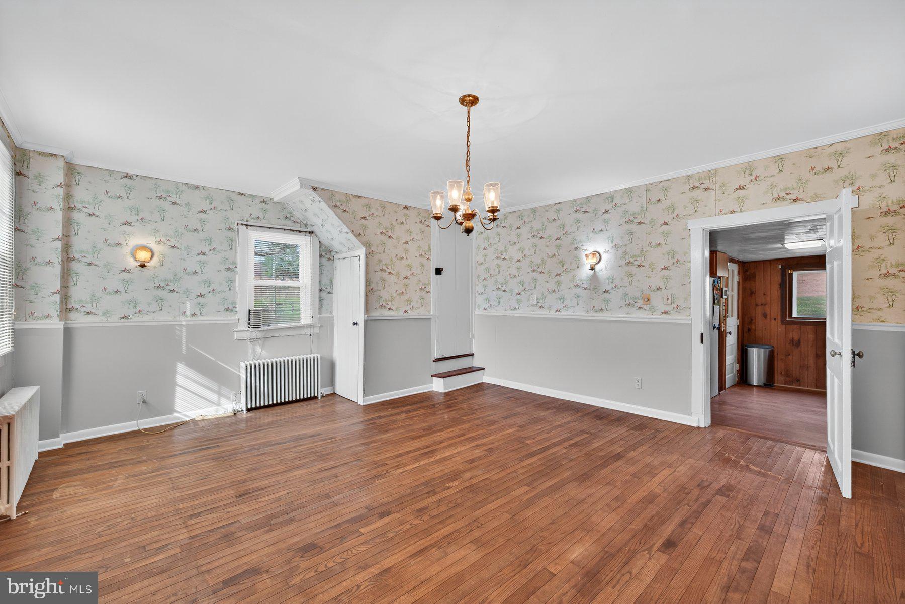 16306 Trenton Road Upperco, MD 21155 - Photo 10 of 55 a view of an empty room with window and wooden floor
