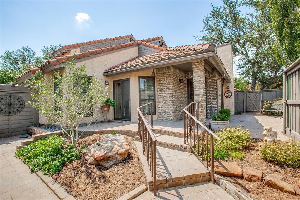 777 Custer Road, Unit 44 Richardson, TX 75080 - Photo 1 of 1 a view of a house with backyard and sitting area