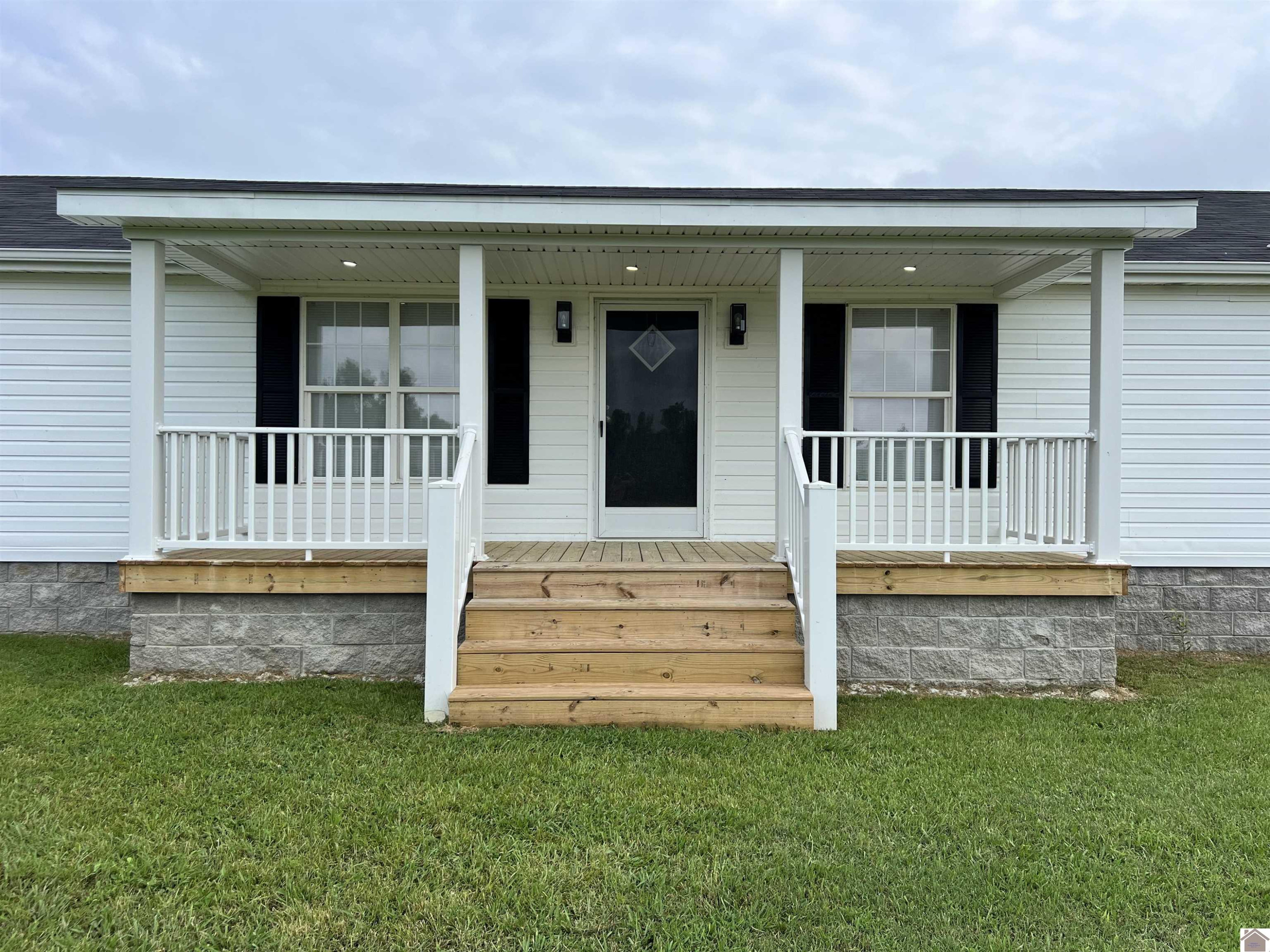 976 Charley Miller Road Almo, KY 42020 - Photo 3 of 32 Inviting New Front Porch