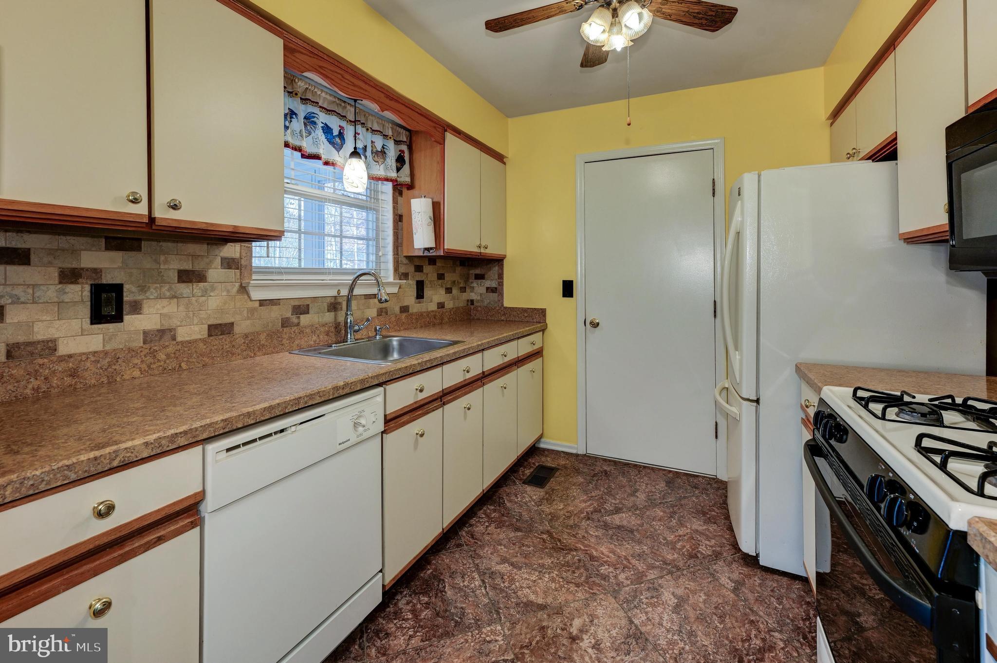 13 Spruce Avenue Hammonton, NJ 08037 - Photo 9 of 25 Kitchen opens to garage