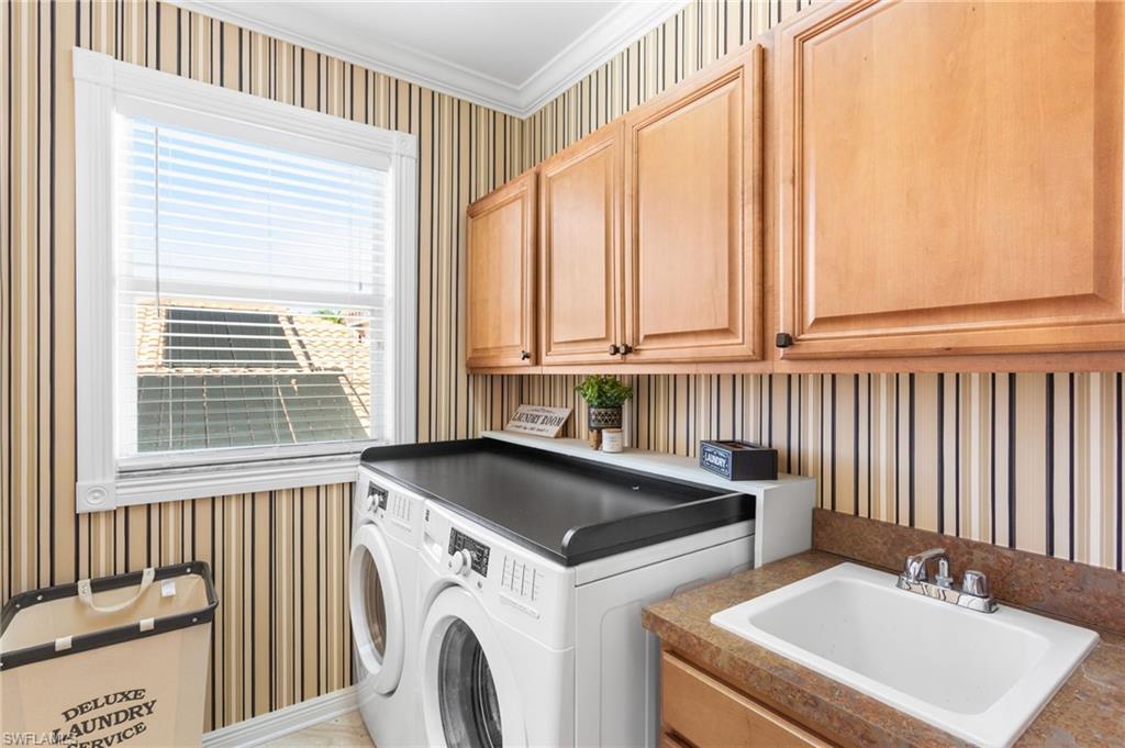 2135 Par Drive Naples, FL 34120 - Photo 28 of 46 a utility room with dryer and washer