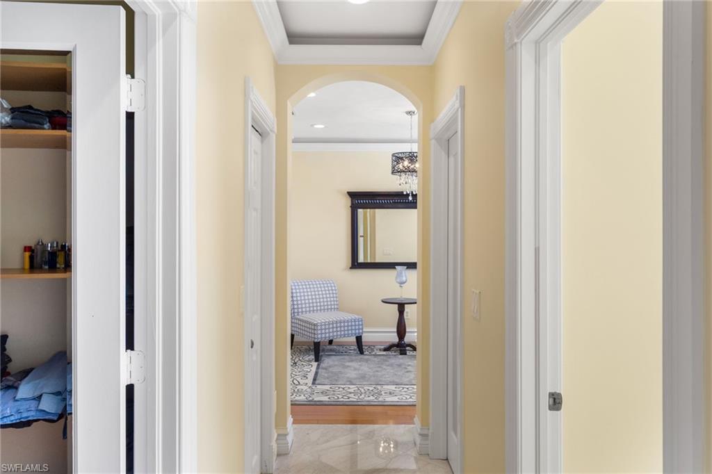 2135 Par Drive Naples, FL 34120 - Photo 29 of 46 a bathroom with a mirror sink and toilet