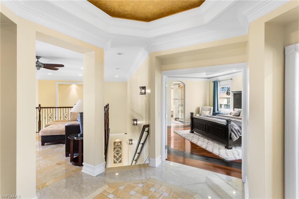 2135 Par Drive Naples, FL 34120 - Photo 31 of 46 a view of a livingroom with furniture and a ceiling fan