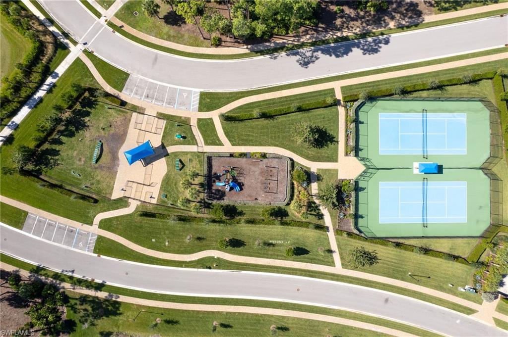 2135 Par Drive Naples, FL 34120 - Photo 41 of 46 a view of swimming pool with a yard and plants