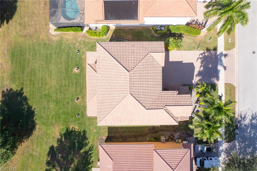 2135 Par Drive Naples, FL 34120 - Photo 9 of 46 a view of a house with a yard