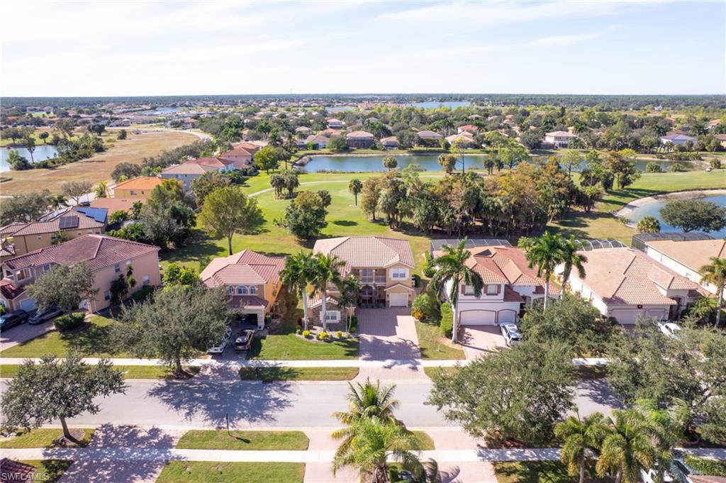 2135 Par Drive Naples, FL 34120 - Photo 10 of 46 an aerial view of multiple house