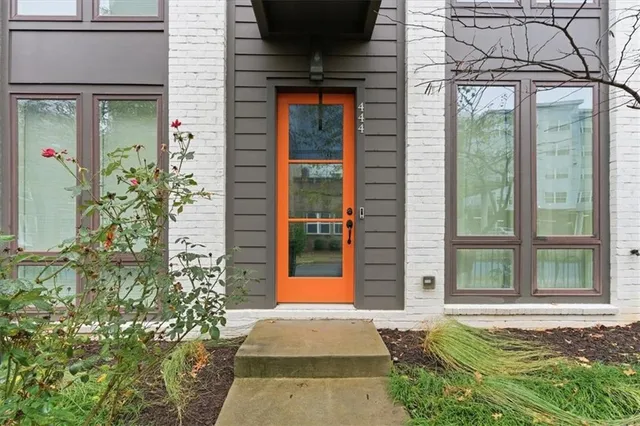 a view of a door of the house with a porch