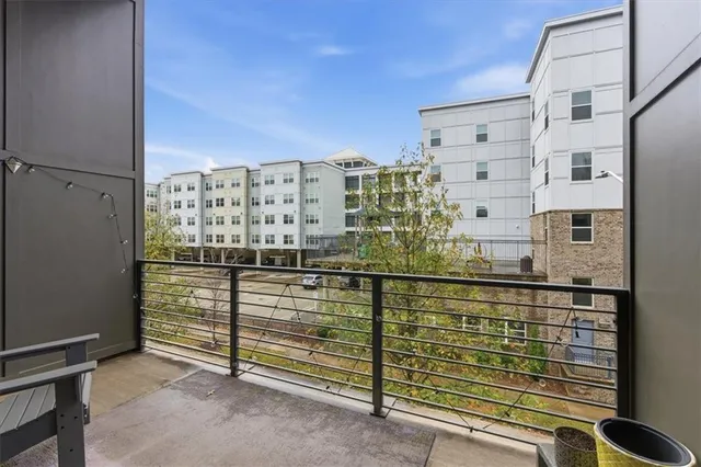 a view of a balcony with city view