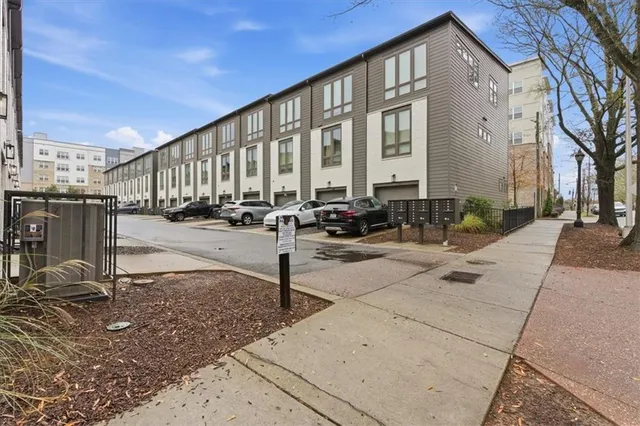 a view of a building with sitting area