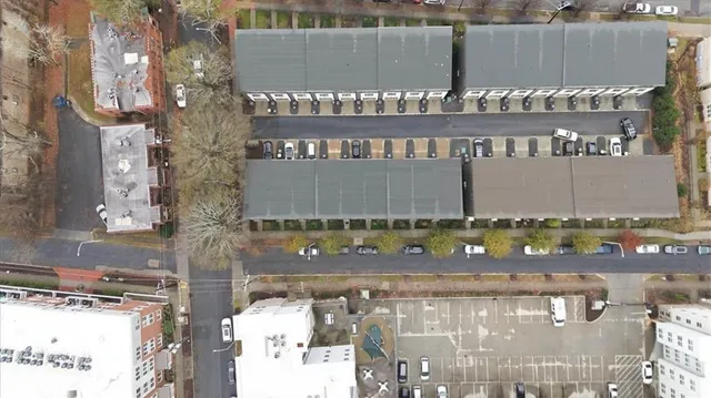 a front view of a building with retail shops