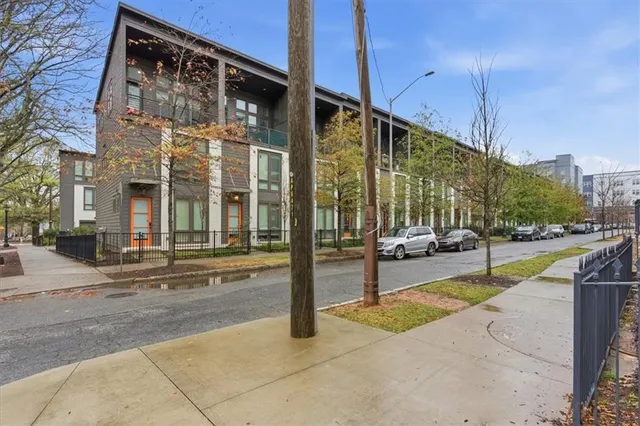 a view of a building with sitting area