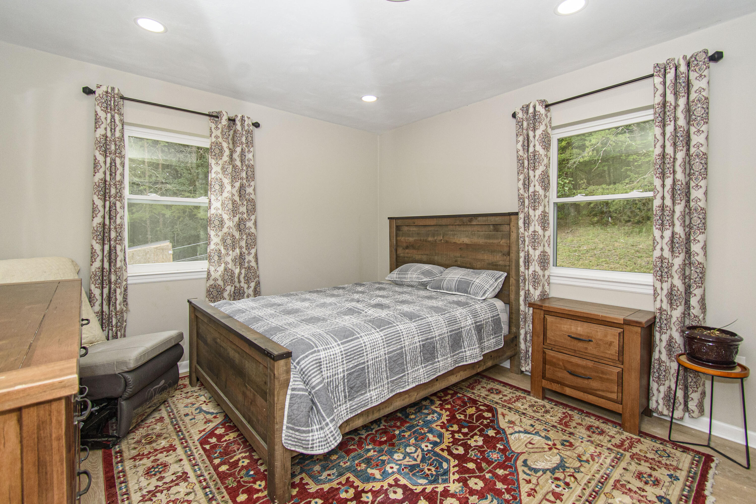 2801 Flatwoods Road Elliston, VA 24087 - Photo 15 of 56 a bedroom with a bed and a window
