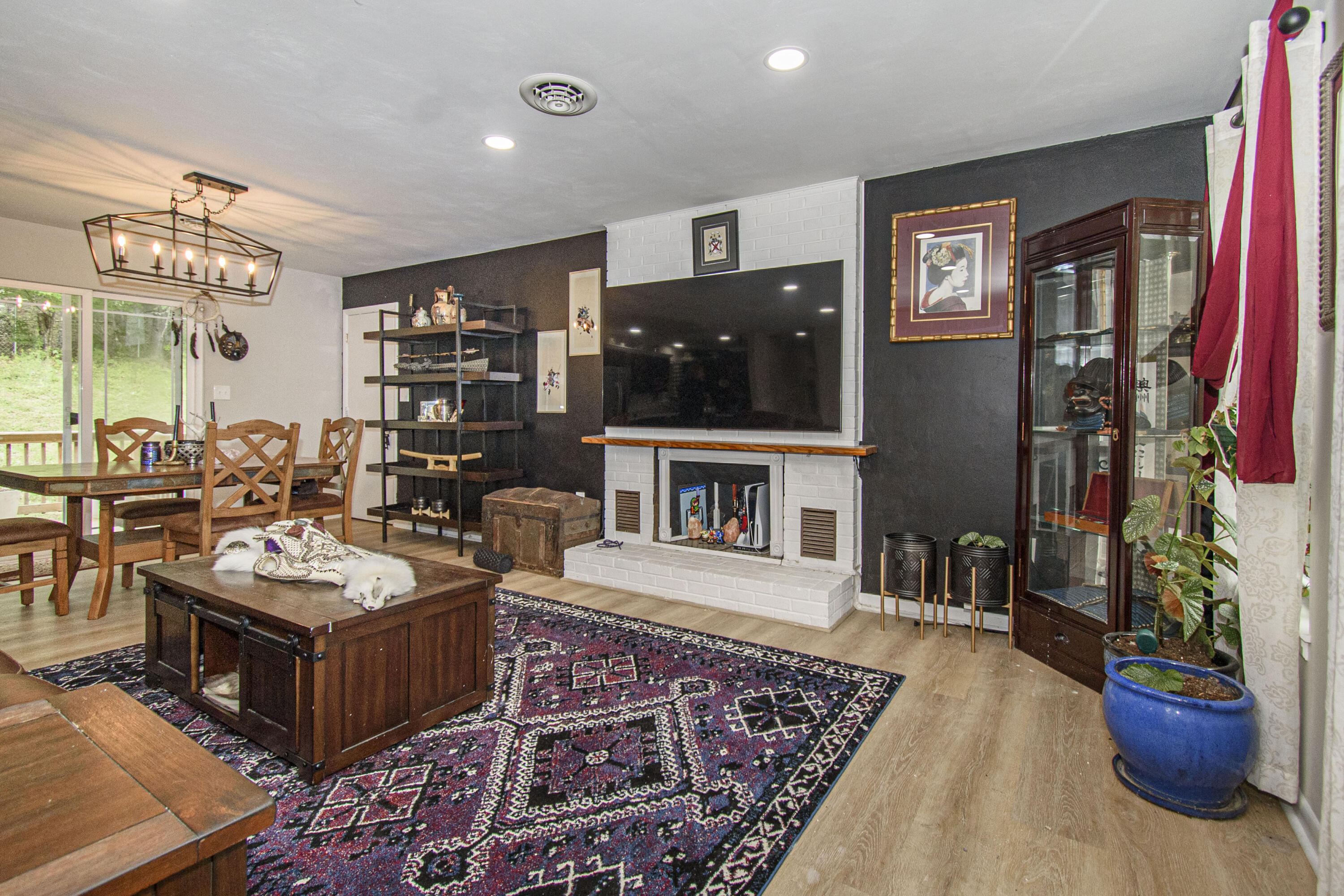 2801 Flatwoods Road Elliston, VA 24087 - Photo 2 of 56 a living room with furniture and a flat screen tv