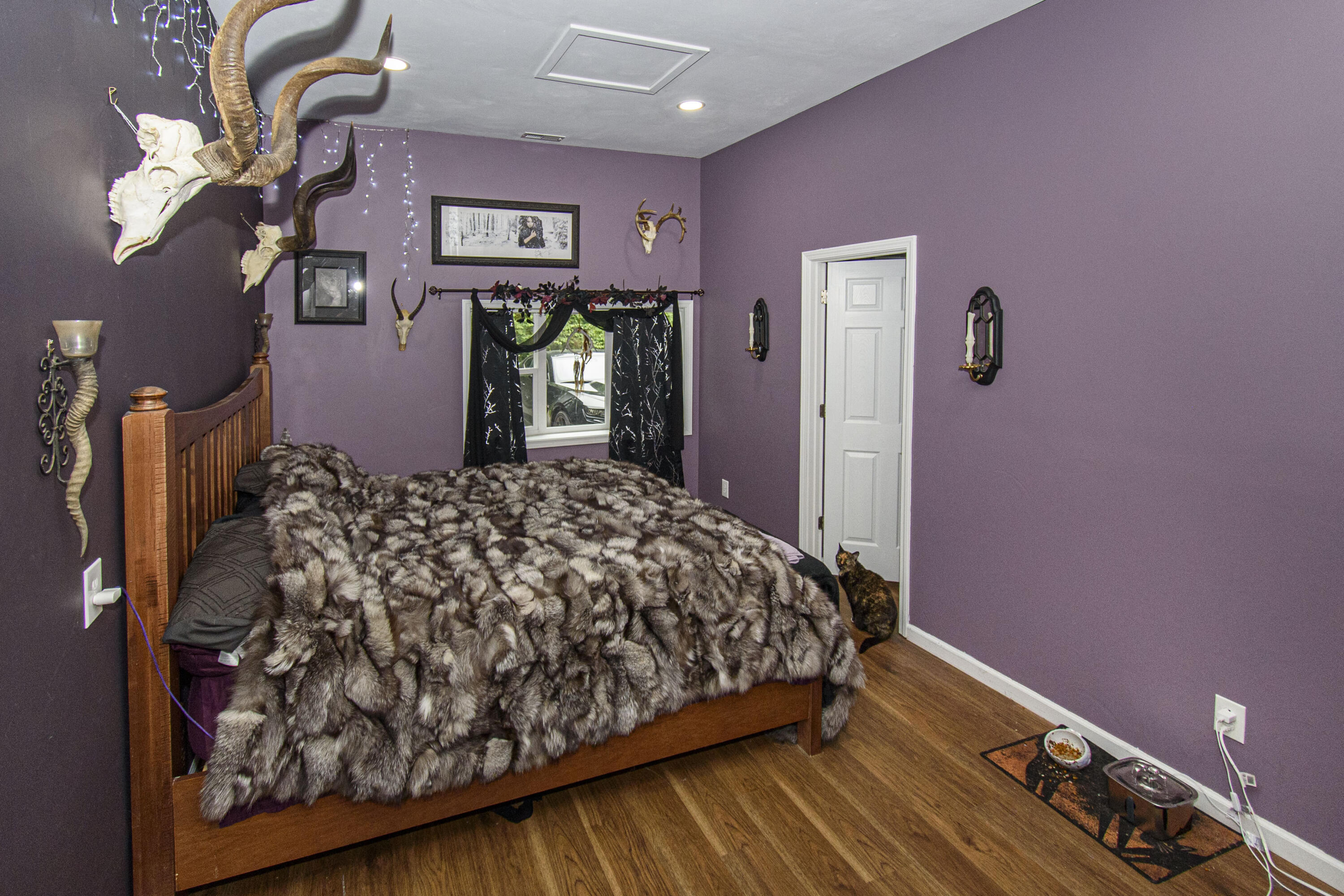 2801 Flatwoods Road Elliston, VA 24087 - Photo 22 of 56 a bed sitting in a spacious bedroom next to a window