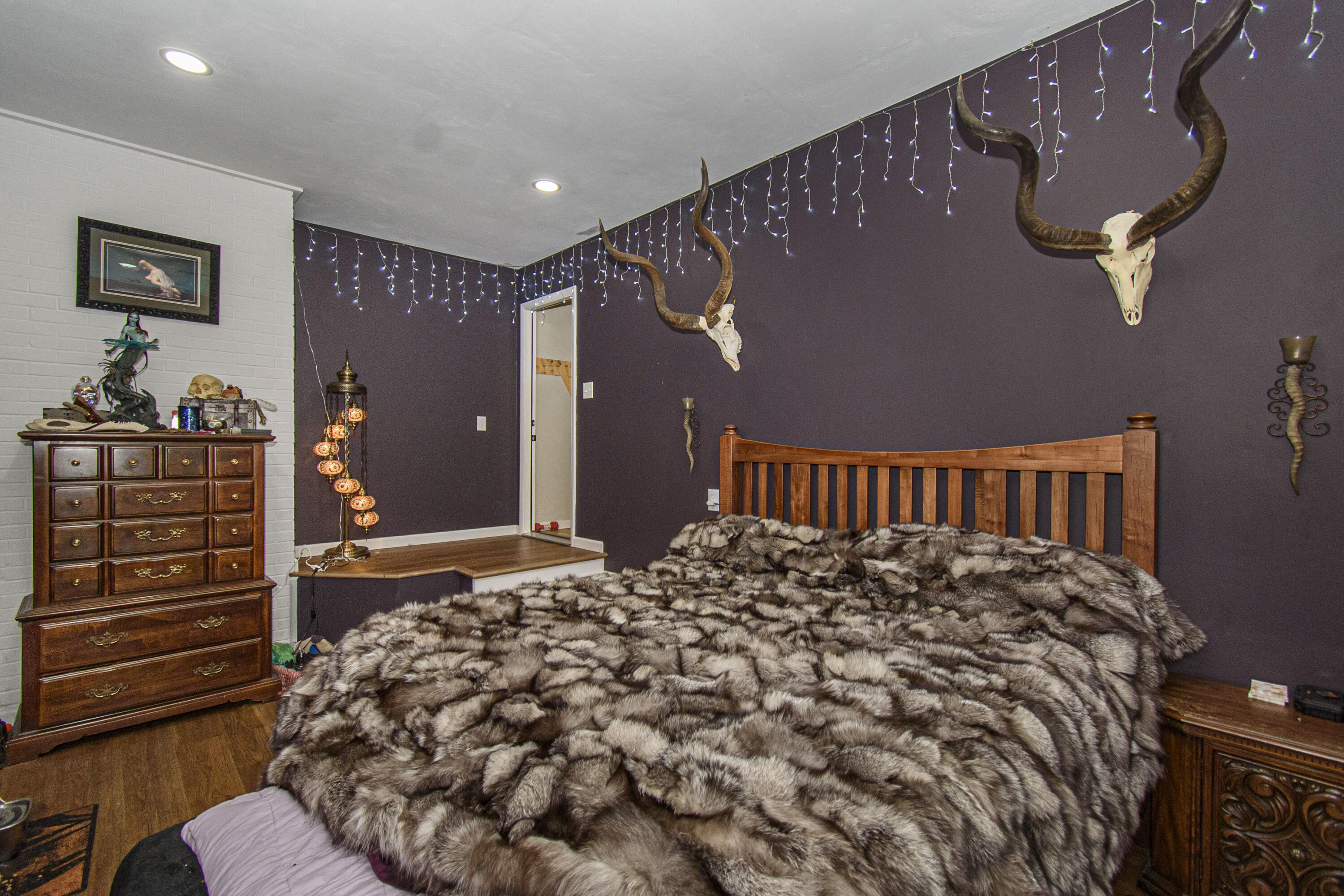 2801 Flatwoods Road Elliston, VA 24087 - Photo 24 of 56 a large bed sitting in a bedroom next to a cabinet