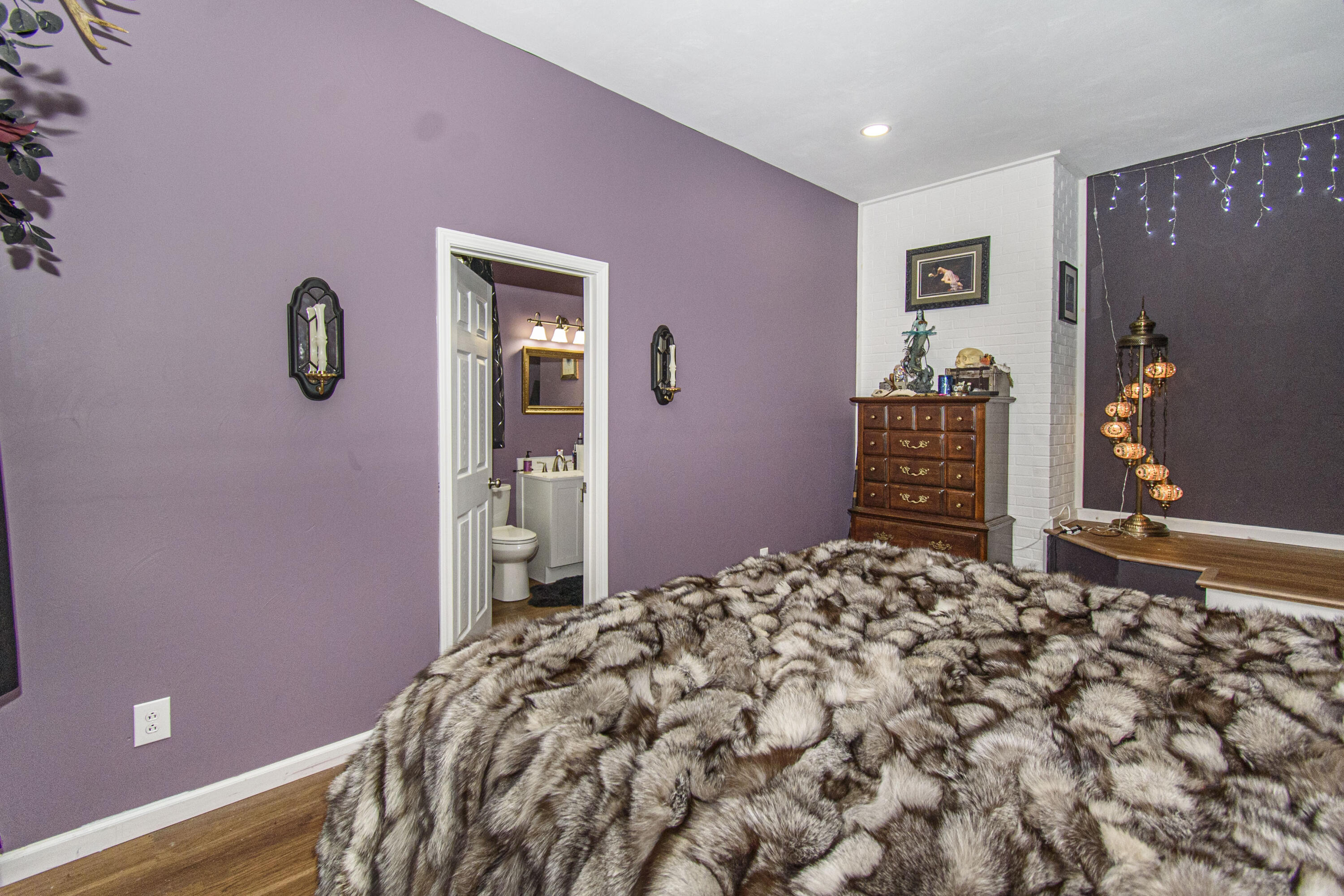 2801 Flatwoods Road Elliston, VA 24087 - Photo 27 of 56 a bedroom with a bed and a dresser