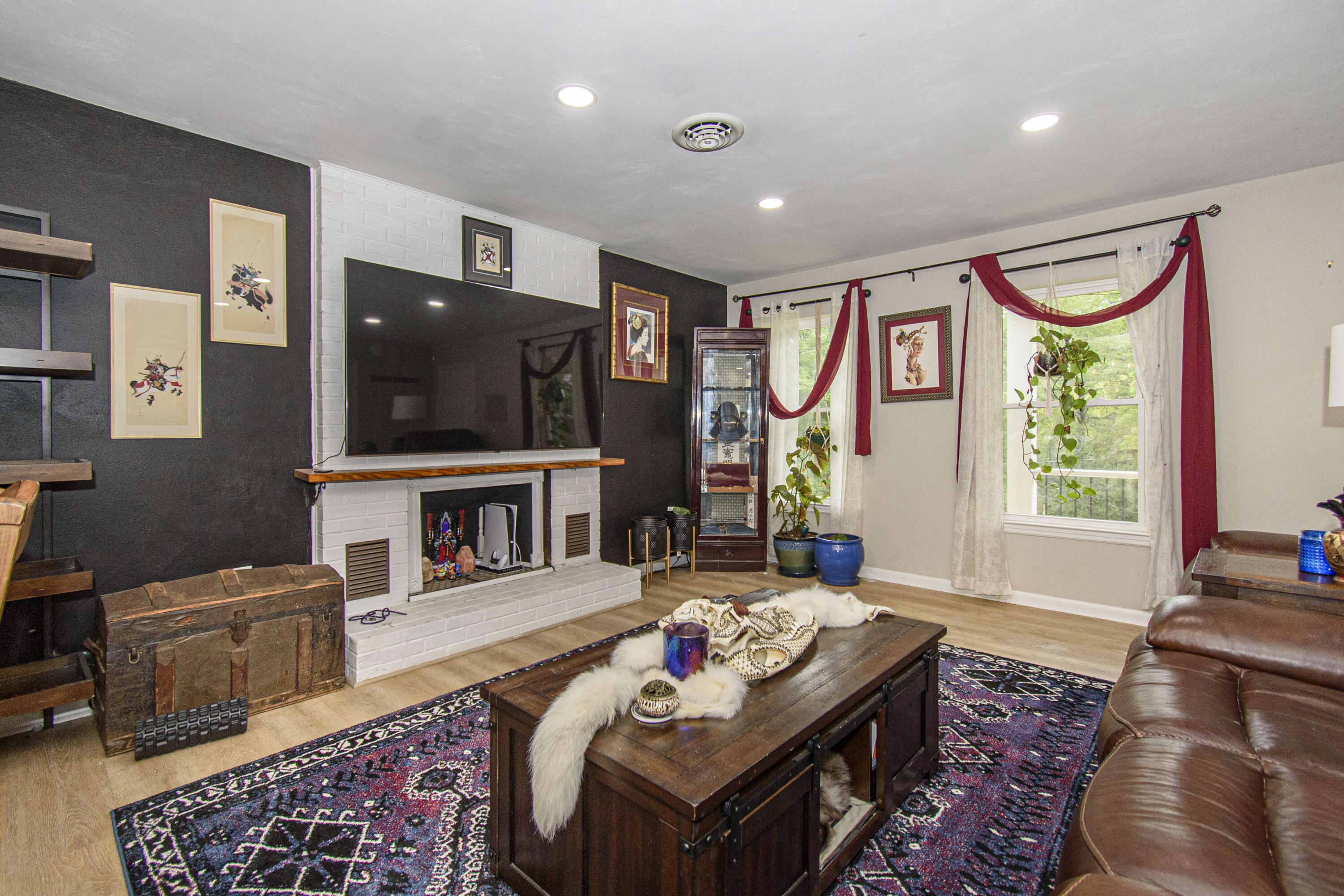 2801 Flatwoods Road Elliston, VA 24087 - Photo 3 of 56 a living room with fireplace furniture and a flat screen tv