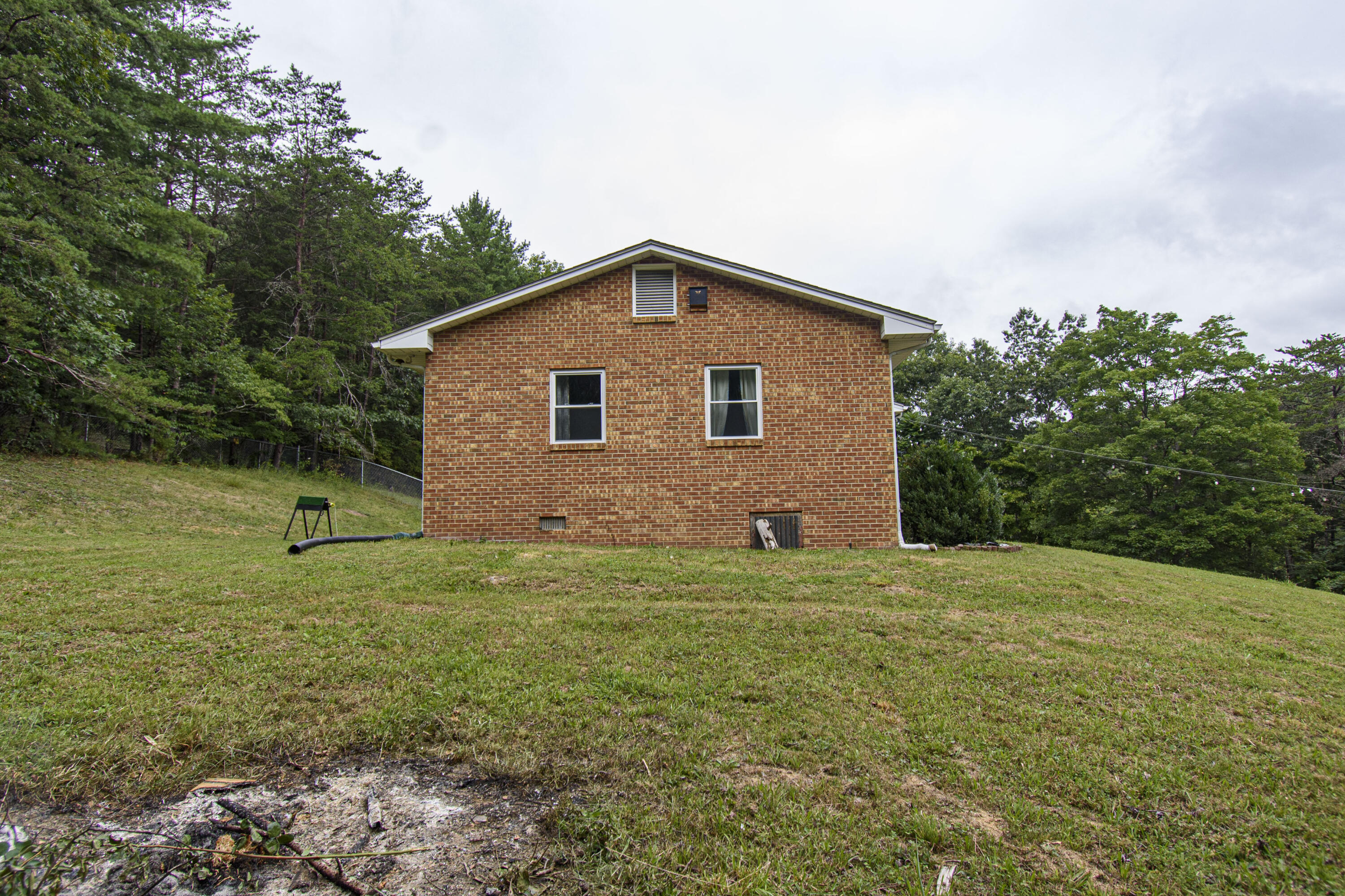 2801 Flatwoods Road Elliston, VA 24087 - Photo 39 of 56 a backyard of a house with lots of green space