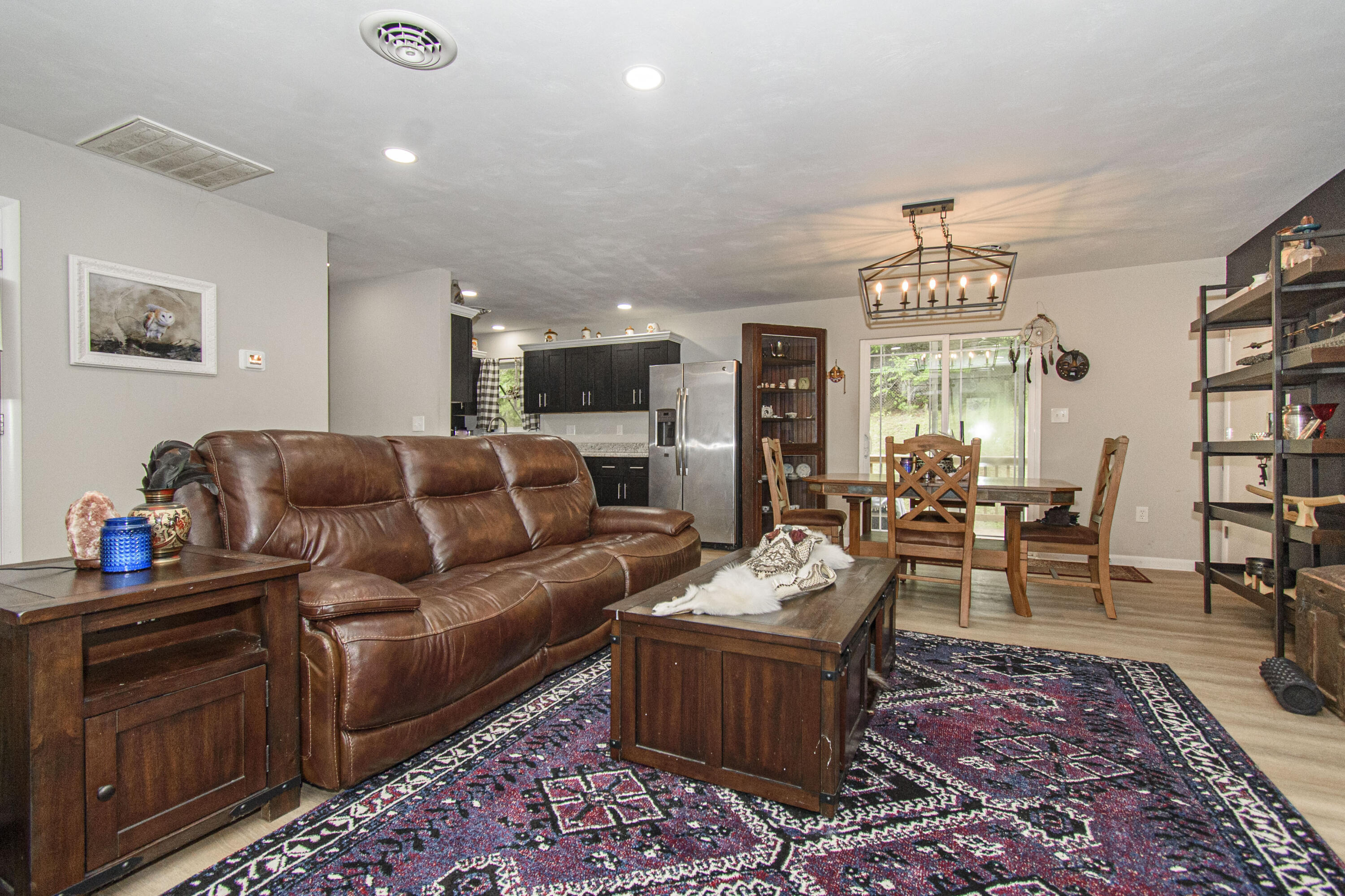 2801 Flatwoods Road Elliston, VA 24087 - Photo 4 of 56 a living room with furniture and a large window