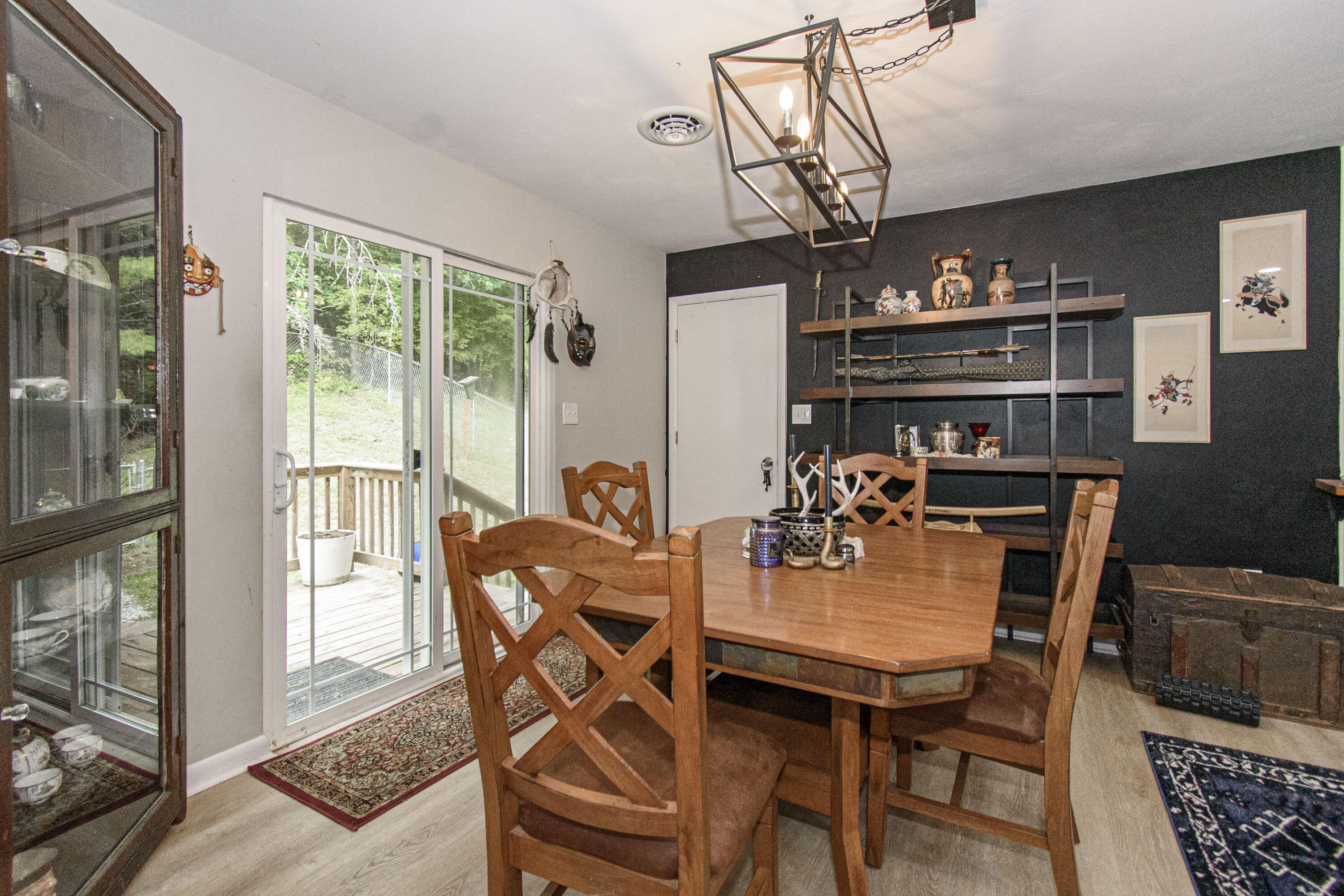 2801 Flatwoods Road Elliston, VA 24087 - Photo 6 of 56 a view of a dining room with furniture window and outside view