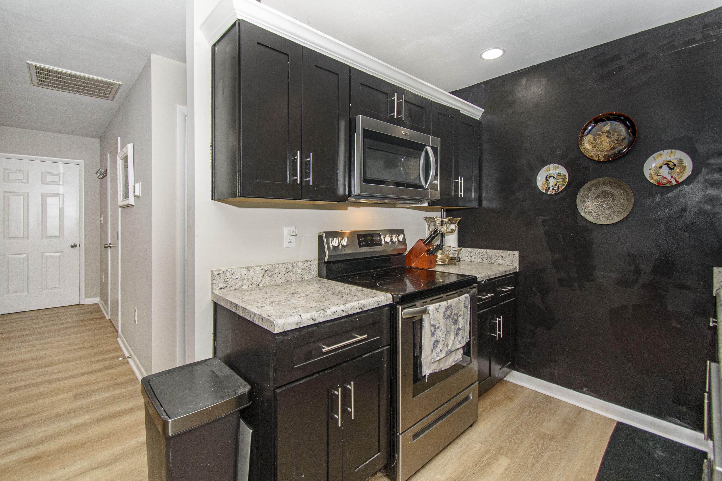 2801 Flatwoods Road Elliston, VA 24087 - Photo 10 of 56 a kitchen with a stove and a microwave