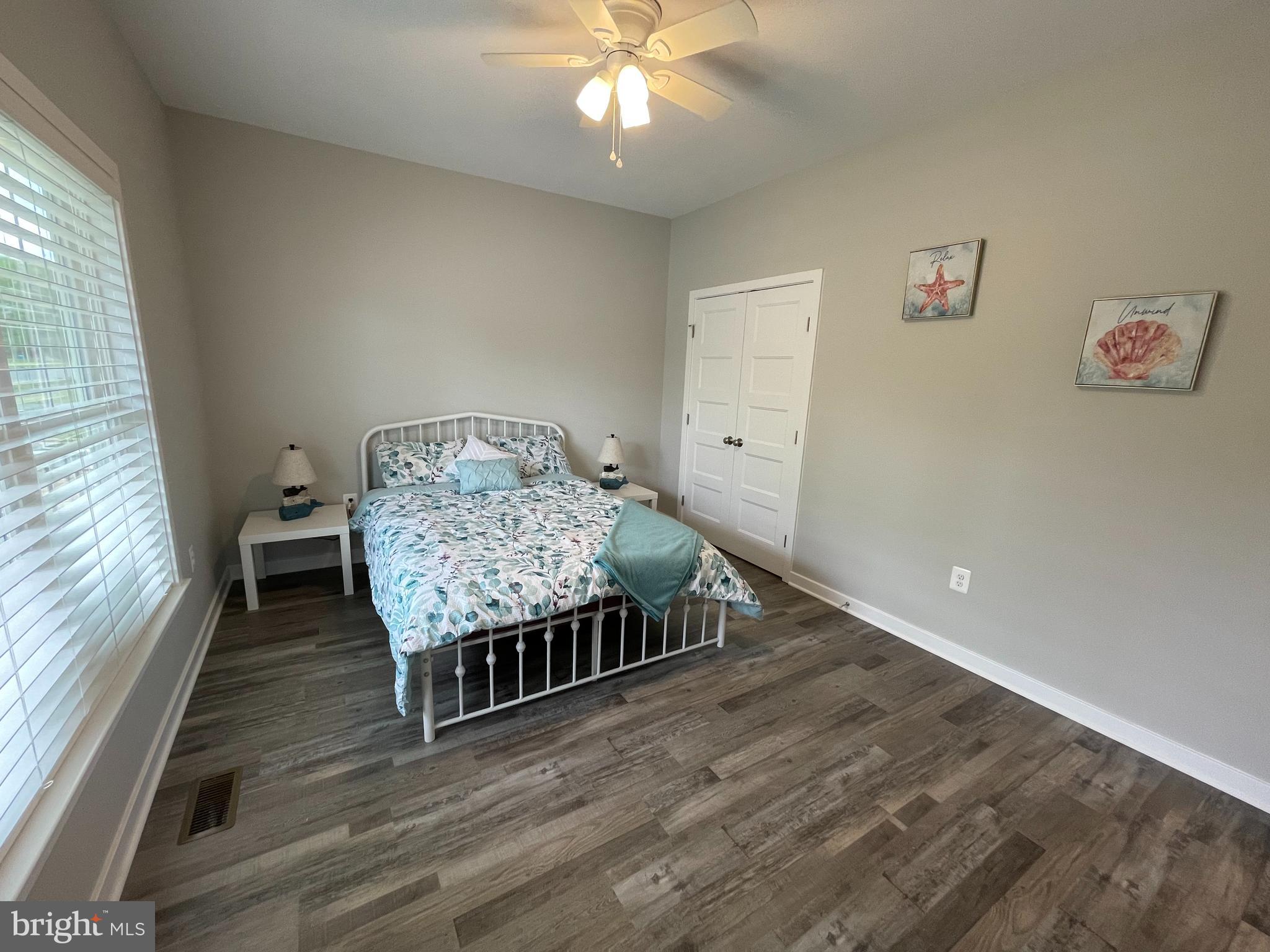 325 2nd Street Colonial Beach, VA 22443 - Photo 9 of 14 a living room with furniture and a wooden floor