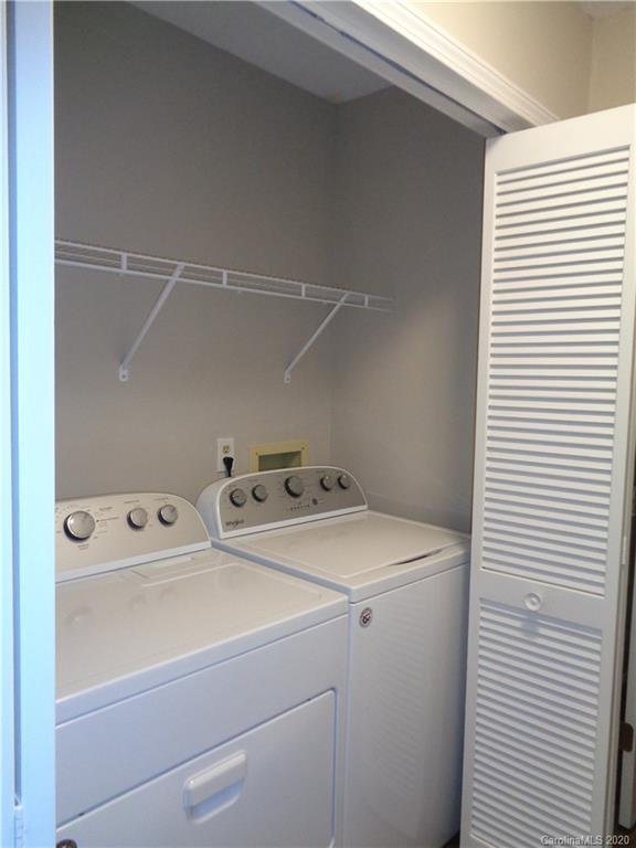 28006 Marina Drive, Unit 6 Tega Cay, SC 29708 - Photo 29 of 32 a utility room with dryer and washer