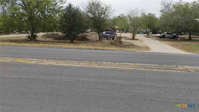 a view of road with yard