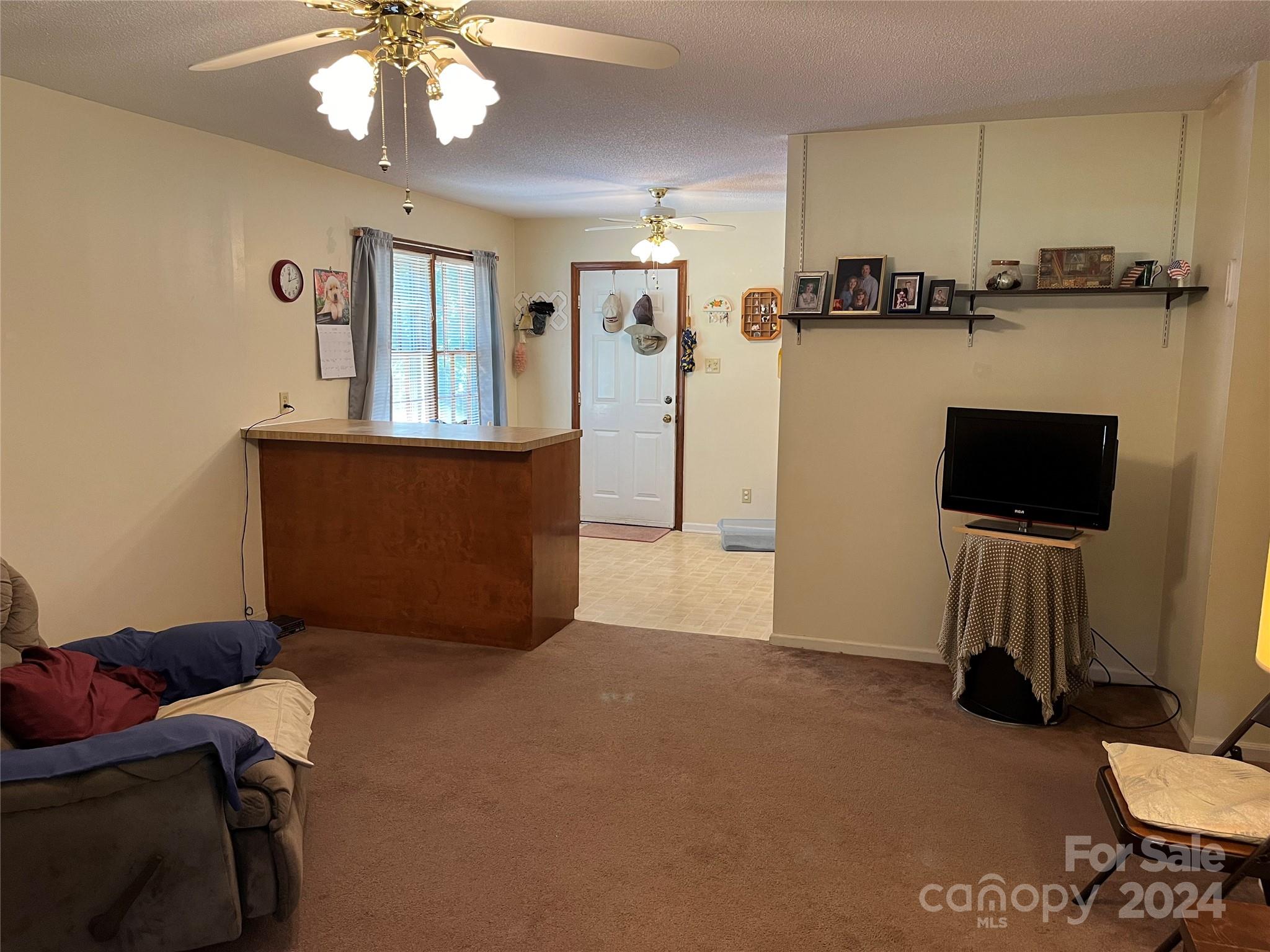 1821 Reservation Road Rock Hill, SC 29730 - Photo 6 of 22 a living room with furniture and a flat screen tv