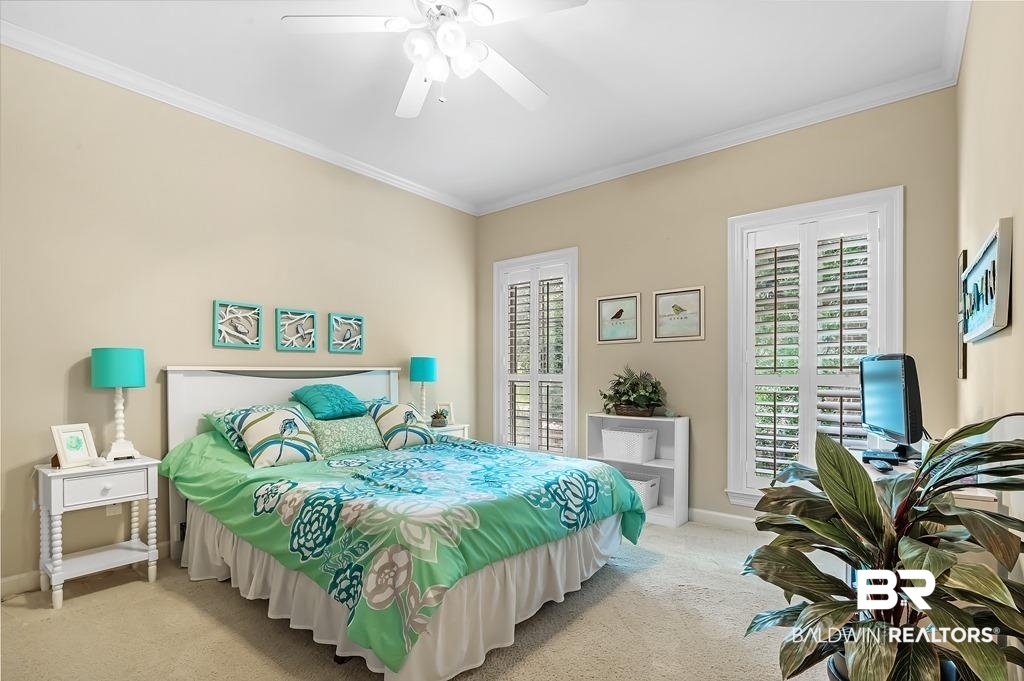 29976 Dolive Ridge Daphne, AL 36527 - Photo 35 of 58 Carpeted bedroom with multiple windows, ceiling fan, and ornamental molding
