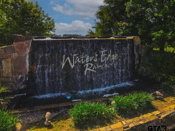a view of a street with a bench
