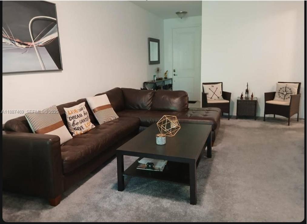 3575 Northwest 1st Street Pompano Beach, FL 33069 - Photo 3 of 18 a living room with furniture