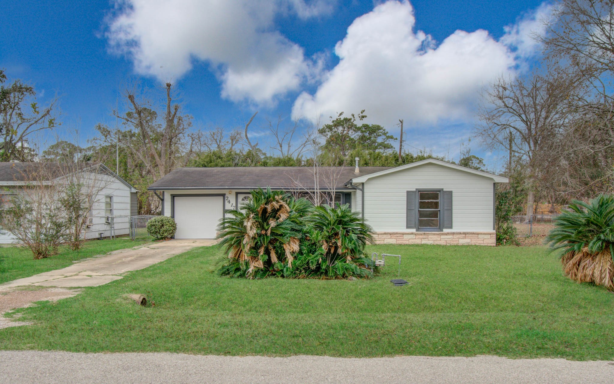 2417 Pecan Street Dickinson, TX 77539 - Photo 5 of 43 front view of house with a yard