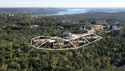 an aerial view of house with yard