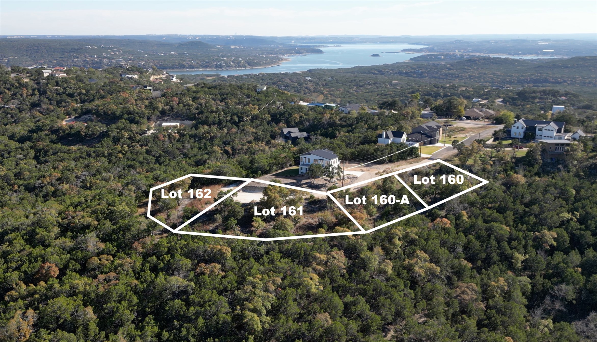an aerial view of house with yard
