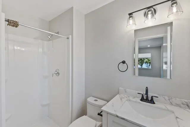 a view of balcony with furniture