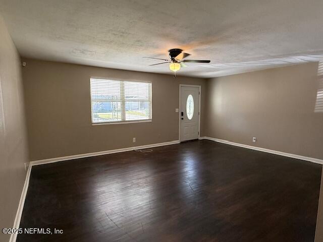 2819 Robinette Drive Orange Park, FL 32073 - Photo 3 of 15 an empty room with wooden floor and windows