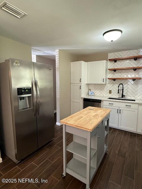 2819 Robinette Drive Orange Park, FL 32073 - Photo 6 of 15 a kitchen with a refrigerator and a sink