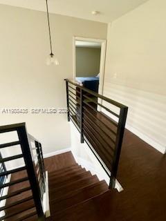 18163 Southwest 149th Place Miami, FL 33187 - Photo 12 of 49 a view of entryway and hall with wooden floor