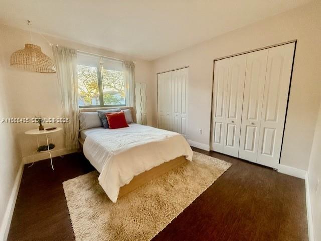 18163 Southwest 149th Place Miami, FL 33187 - Photo 27 of 49 a bedroom with a bed and a window