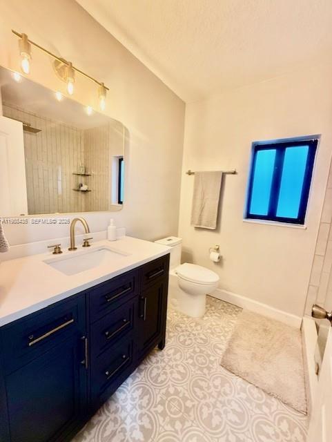 18163 Southwest 149th Place Miami, FL 33187 - Photo 29 of 49 a bathroom with a granite countertop double vanity sink a mirror and a bathtub