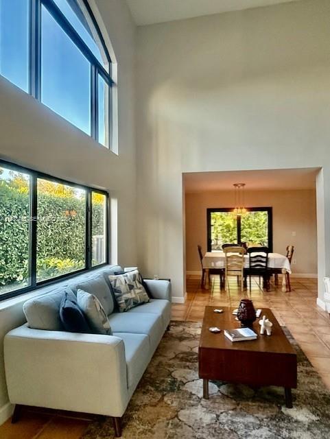 18163 Southwest 149th Place Miami, FL 33187 - Photo 35 of 49 a living room with furniture and a large window