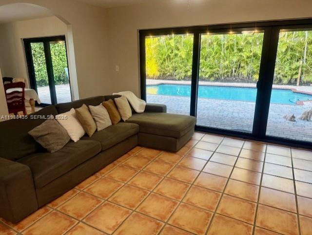 18163 Southwest 149th Place Miami, FL 33187 - Photo 40 of 49 a living room with a large window