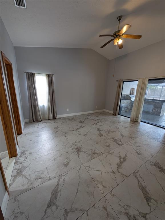 2106 Whitlock Place Dover, FL 33527 - Photo 27 of 83 wooden floor in an empty room with a window